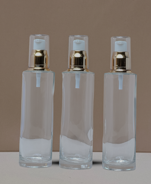 100Ml Glass Bottle With Gold Treatment Pump (Flat)