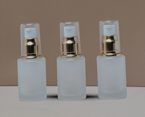 30Ml Glass Bottle With Gold Treatment Pump (Flat)