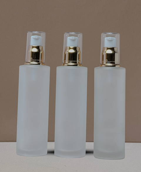 100Ml Glass Bottle With Gold Treatment Pump (Flat)