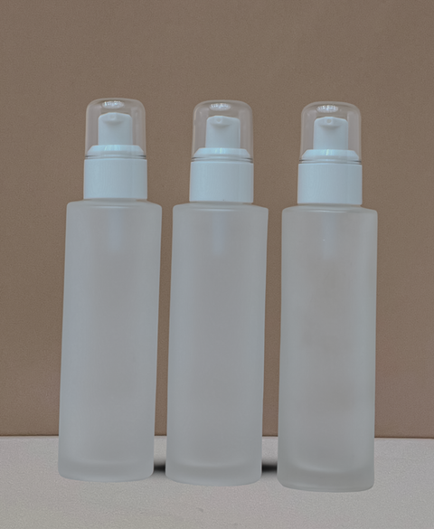 100Ml Glass Bottle With White Treatment Pump (Flat)