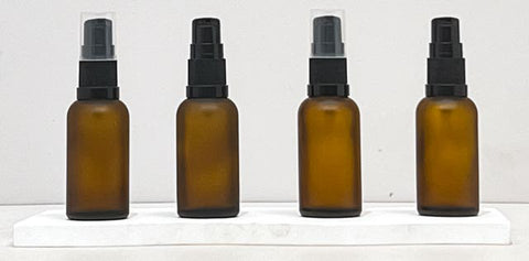 30Ml Glass Bottle With Black Treatment Pump (Round)