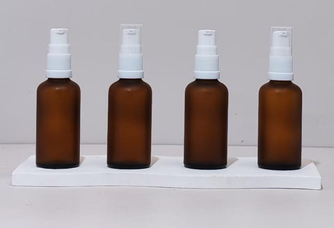 50Ml Glass Bottle With White Treatment Pump (Round)