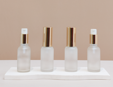 30ml Glass Bottle with Gold Treatment Pump