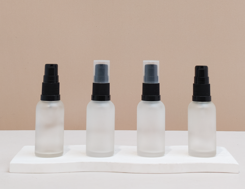 30Ml Glass Bottle With Black Treatment Pump (Round)
