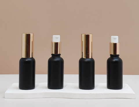 30ml Glass Bottle with Gold Treatment Pump