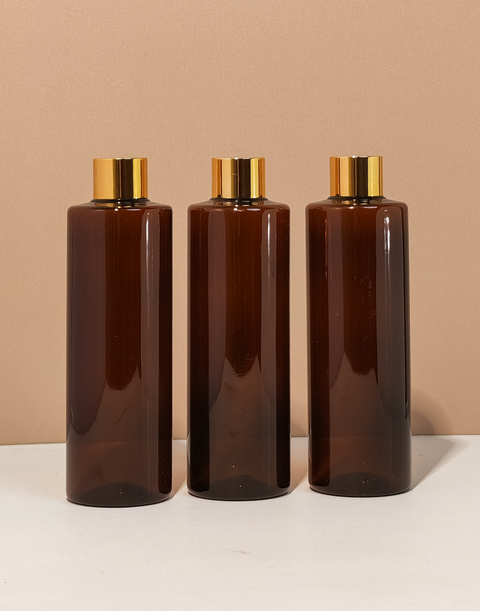 250Ml Tall Pet Bottle With Gold Shinny Screw Caps